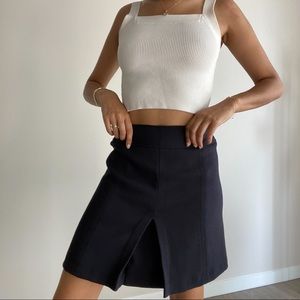 Dark blue skirt with pleat in front